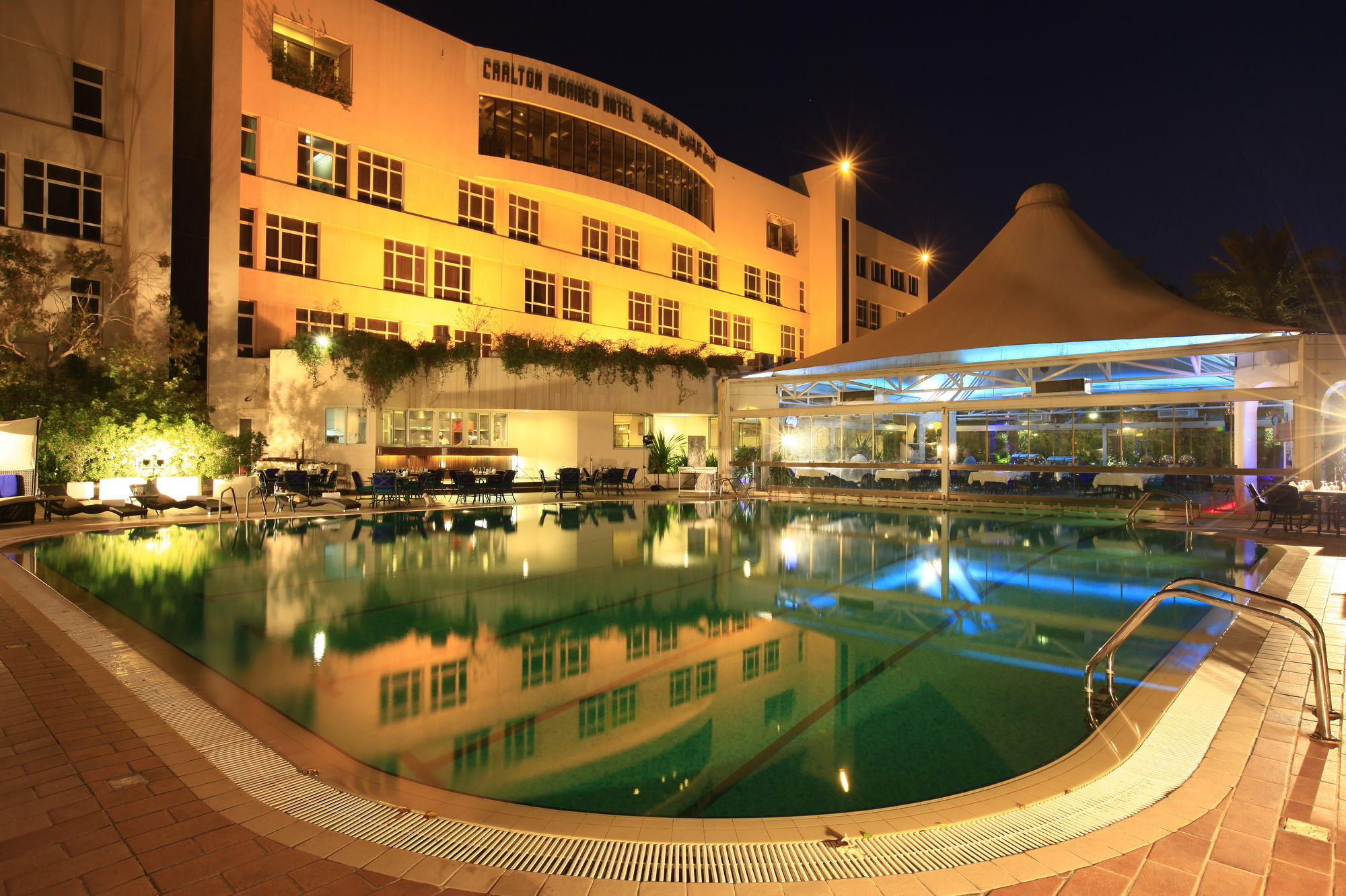 Carlton Al Moaibed Hotel Dammam Bagian luar foto The swimming pool at the hotel